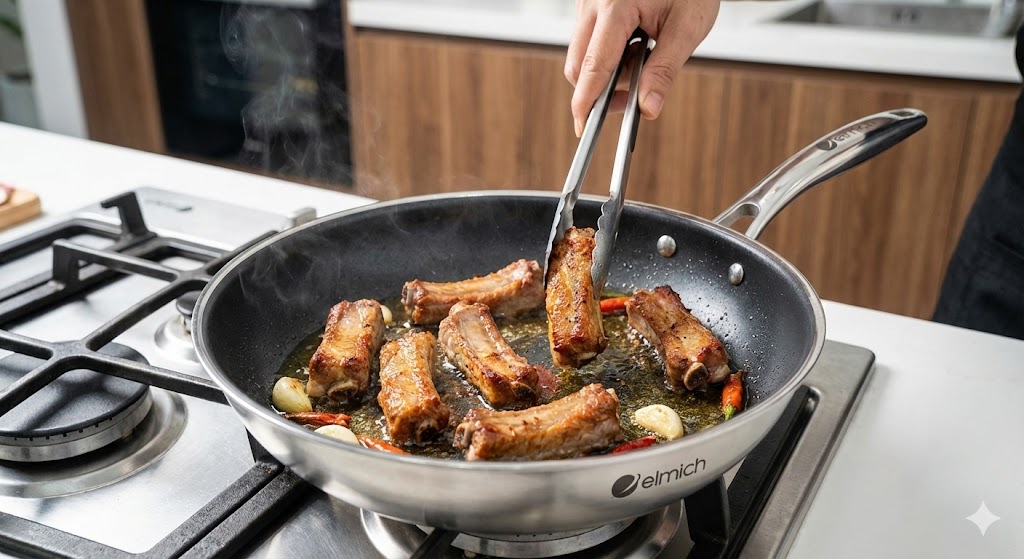 Chiên sườn vàng giòn bằng chảo chống dính inox Elmich Trimax